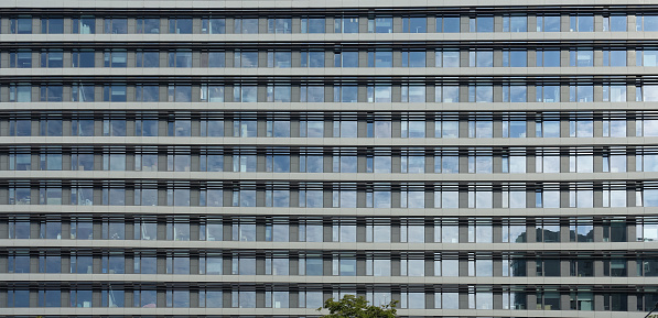 Texture of the glass facade of a skyscraper or office