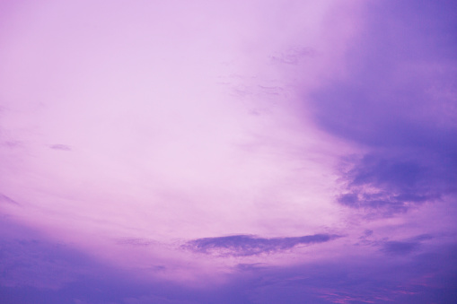 Purple sky with clouds in dusk.
