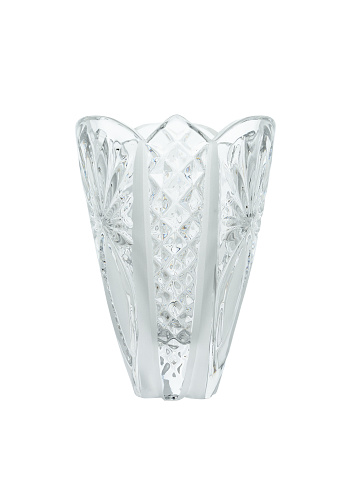 empty crystal vase in the shape of a glass isolated on a white background, close-up