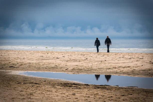 Walker on the North Sea island Amrum, Germany.