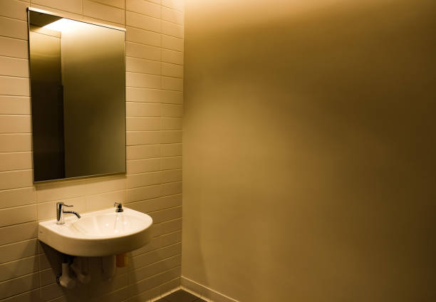 istock City Restroom Sink and Mirror 1422263525
