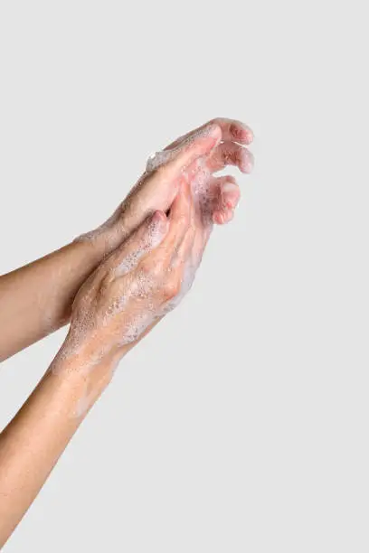 Washing hands with soap. Concept of hygiene to protective pandemic coronavirus. Spa products