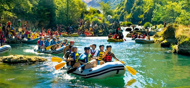Group of people rafting on ''Una'' river. Bihac, Bosnia and Herzegovina.