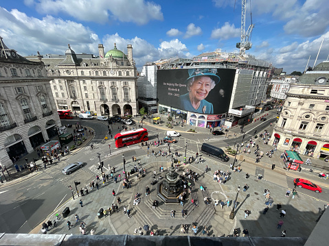 Piccadilly Circus in central London, an iconic location on the day after the death of Queen Elizabeth with huge LED screen . London, UK
