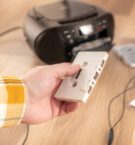 istock Holding a white cassette tape 1422272850