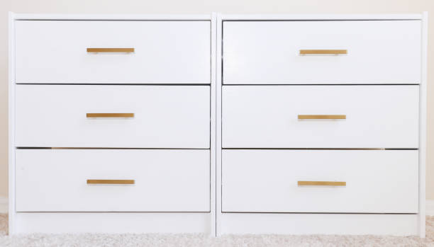 istock White dresser in black background 1422273371