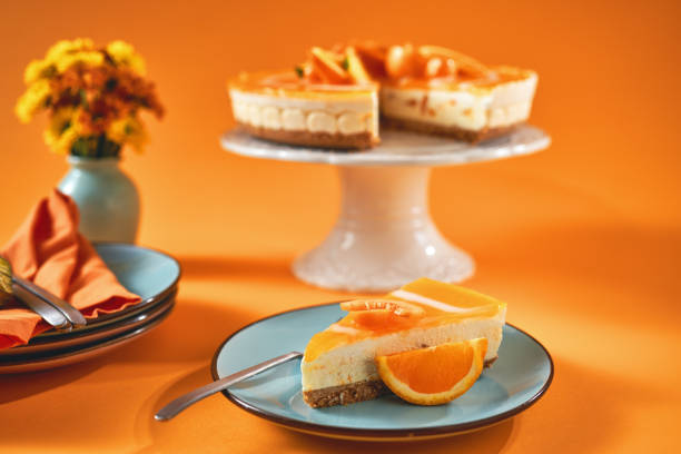 istock Creamy Orange Cheesecake with Whipped Cream 1422281038