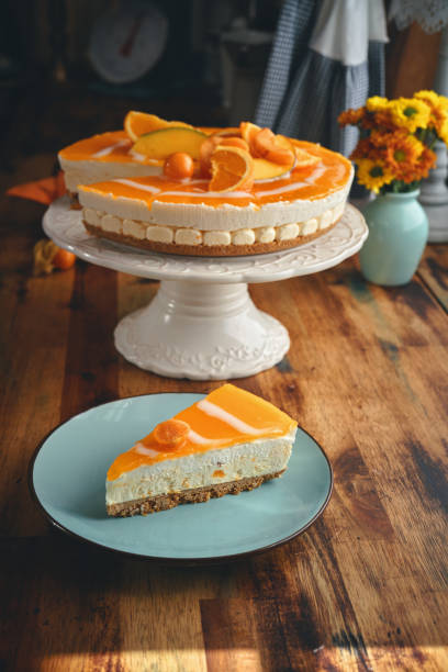 istock Creamy Orange Cheesecake with Whipped Cream 1422281039