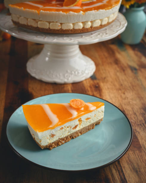 istock Creamy Orange Cheesecake with Whipped Cream 1422281043