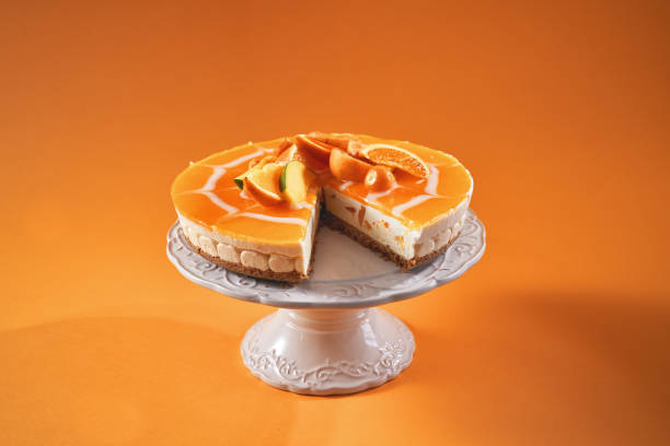 istock Creamy Orange Cheesecake with Whipped Cream 1422281045