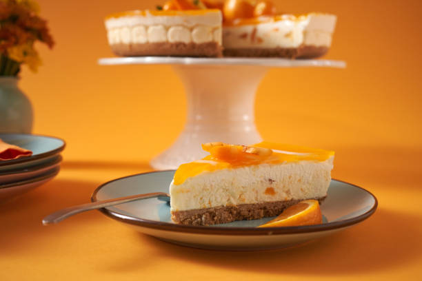 istock Creamy Orange Cheesecake with Whipped Cream 1422281053