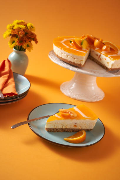 istock Creamy Orange Cheesecake with Whipped Cream 1422281055