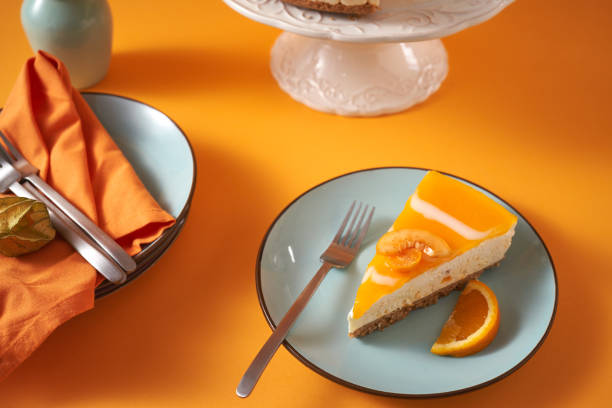 istock Creamy Orange Cheesecake with Whipped Cream 1422281057