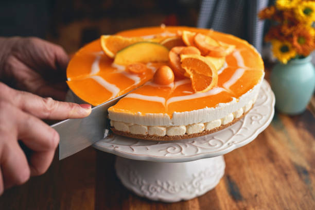 istock Creamy Orange Cheesecake with Whipped Cream 1422281059