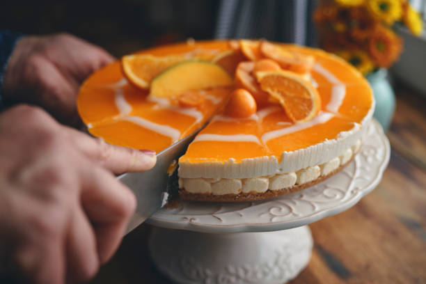 istock Creamy Orange Cheesecake with Whipped Cream 1422281070