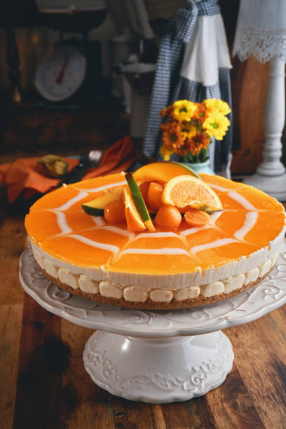 istock Creamy Orange Cheesecake with Whipped Cream 1422281098