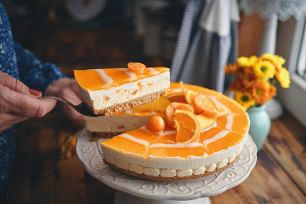 istock Creamy Orange Cheesecake with Whipped Cream 1422281111
