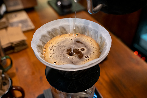 V60 Coffee brewing and serving stock photo