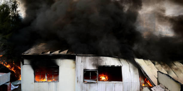 istock Fire burning and black smoke over the factory 1422283793