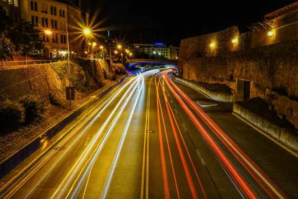 Long Exposure of cars on a highway at night
D.H