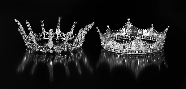 king crown isolated on black background