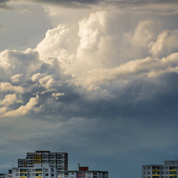 istock Cumulus thunderclouds over city buildings 1422311804
