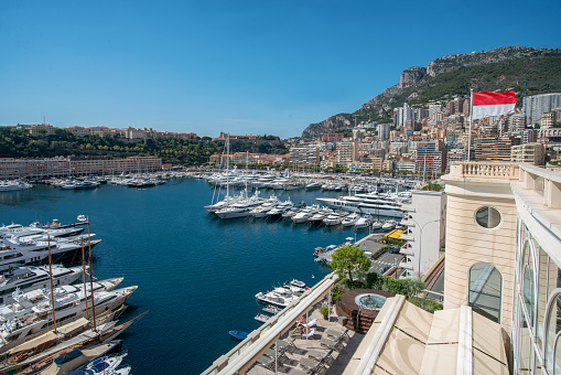 Panorama of bay of Monaco with yachts and buildings and hill- Famous city-state.