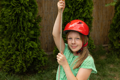 Young beautiful architect woman wearing helmet and glasses over isolated white background smiling and looking at the camera pointing with two hands and fingers to the side.