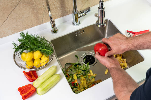 istock Preparing fresh vegetable salad in modern beautiful kitchen 1422319056