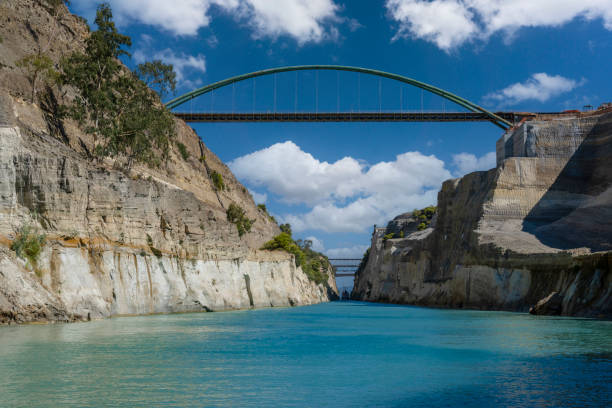 greece's corinth canal crossing and bridges. - gulf of corinth imagens e fotografias de stock