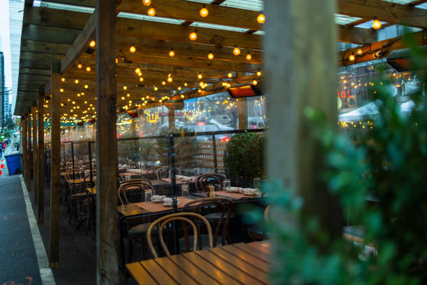 istock Manhattan street cafe with cozy lightning. 1422328767
