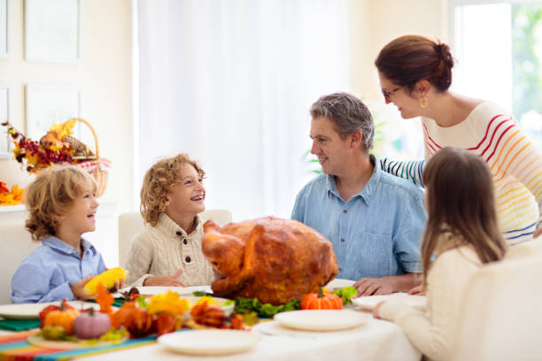 istock Thanksgiving family dinner. Roasted turkey meal. 1422330231