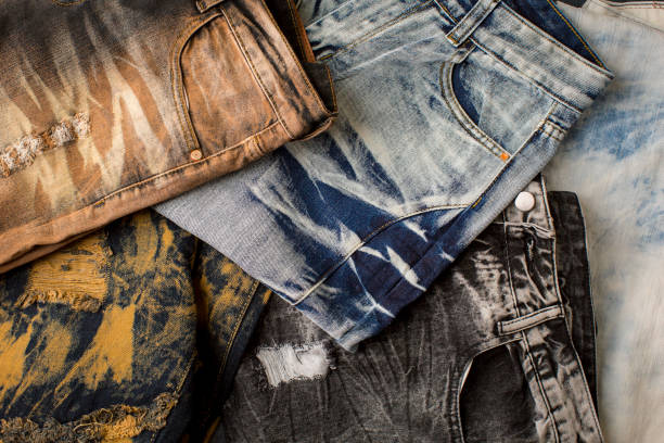 istock Different color and different type of jeans on the table 1422341171