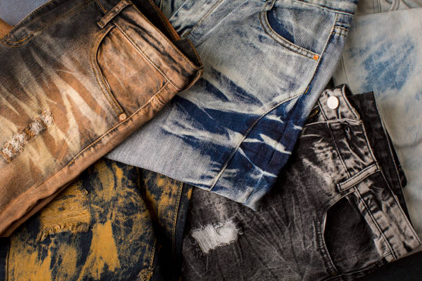 istock Different color and different type of jeans on the table 1422341189