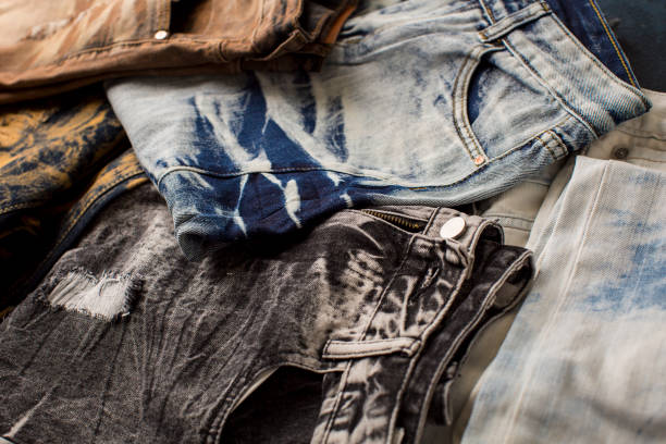 istock Different color and different type of jeans on the table 1422341390