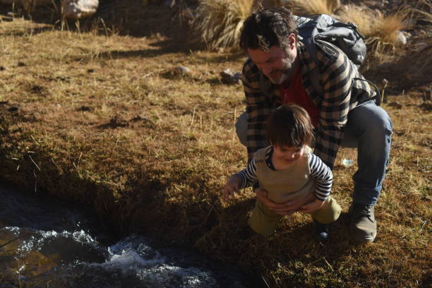 istock father and son on vacation 1422343583