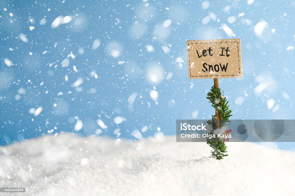 Christmas card Christmas card with let it snow sign Blizzard Stock Photo