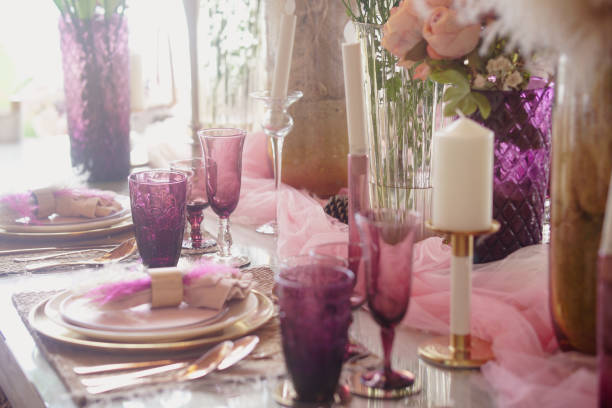 istock glass dishware on dining table. party banquet 1422348283