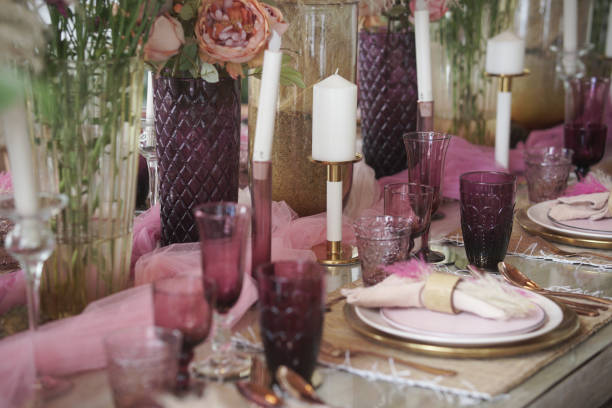 istock glass dishware on dining table. party banquet 1422348290