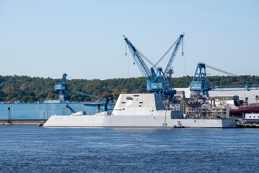 Bath, USA - October 8, 2021. Navy battle ship under maintenance in yard at Bath, Maine, USA