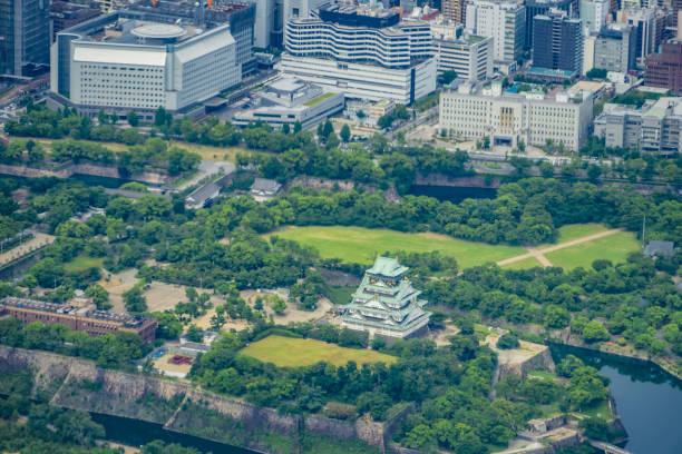 Osaka Castle and Osaka townscape Osaka Castle and Osaka townscape. Shooting Location: Osaka Prefecture osaka castle stock pictures, royalty-free photos & images