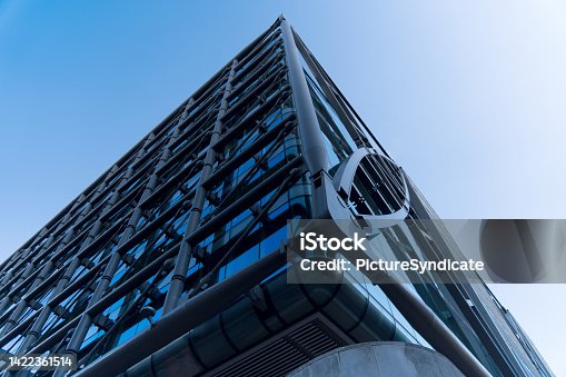 istock modern dark skyscraper against sky reinforced facade 1422361514