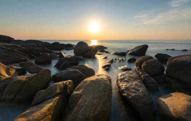 istock sunset on the blue sea and beach 1422377890