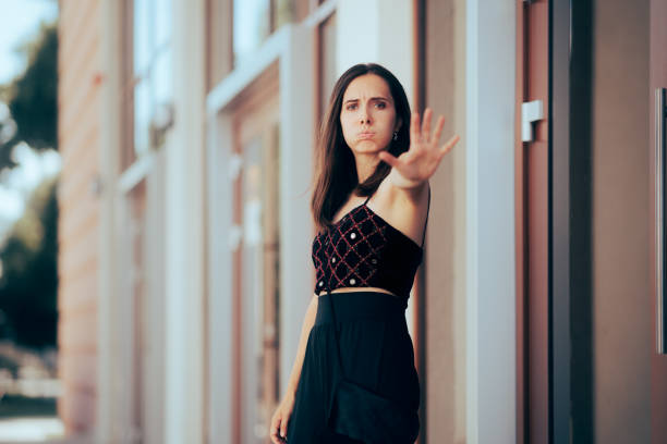 istock Unhappy Woman Making Stop Sign Feeling Bothered 1422381738