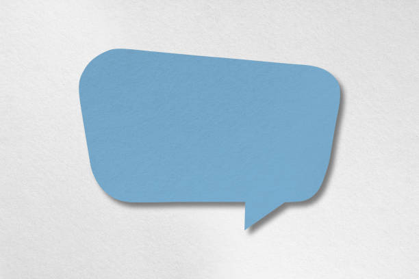 Speech balloon shaped blue paper isolated on white background.