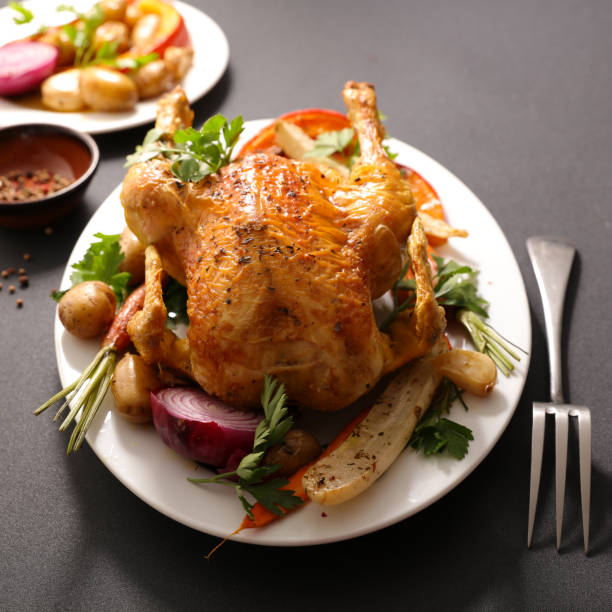 istock roasted chicken poultry with fried vegetables on plate 1422408311