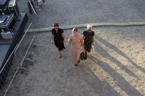 Senigallia, Italy - August 05, 2022 is an international music festival focusing on 1950s American music and culture here by wild dancers a beautiful mode is wearingl  dressed in 50's style