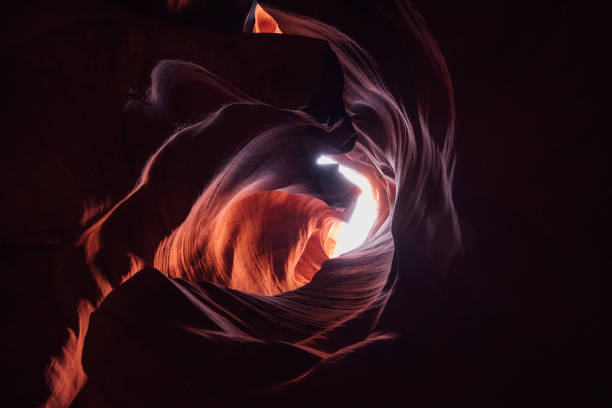 Sunbeam spot inside the amazing colorful and famous Antelope Canyon, Rock Textures and Shades in the early morning light. Page, Arizona, USA