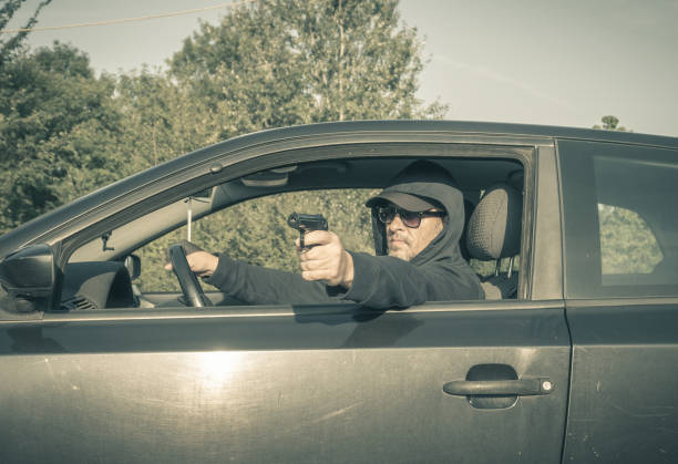 istock The man was shooting from the car 1422418199
