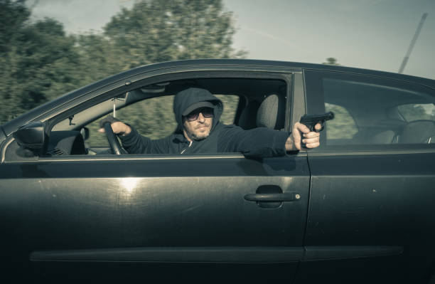 istock The man was shooting from the car 1422418203